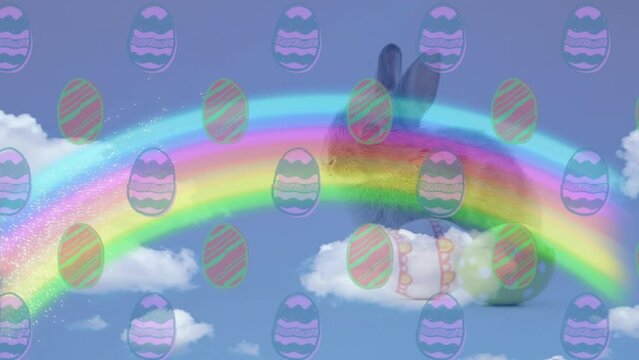 Animation of rainbow and eggs falling over bunny