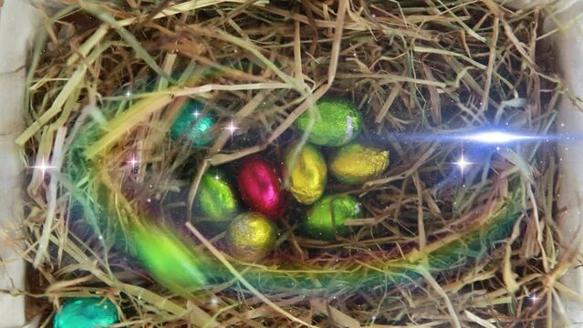 Animation of colorful eggs on dry hay