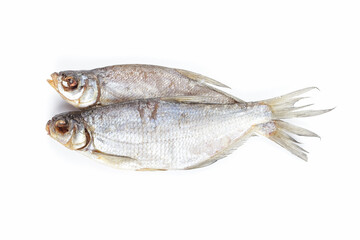 Dried fish isolated on white background. Salty dry river fish. Top view