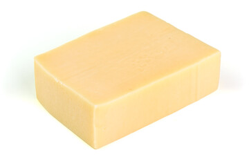 Gouda cheese block, close-up, isolated on white background.