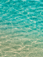 Surface transparent blue sea water.