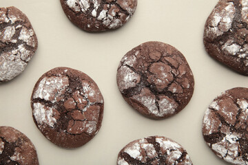 Soft dark chocolate brownie cookies on grey background.