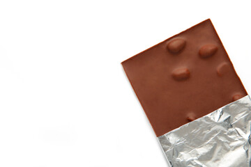 Chocolate wrapped in foil, clipping path, isolated on white background