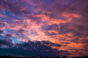 Purple sunset on sky. Natural background, dramatic sky.