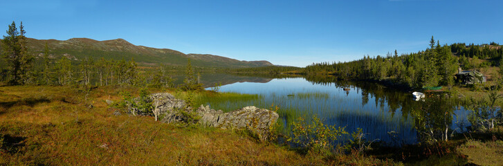 Fototapeta na wymiar Lake, reflections and mountains near Haglebu, Buskerud, Norway