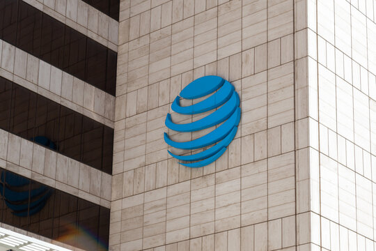 Dallas, Texas,  USA - March 20, 2022: ATT logo on the building at its headquarters at Whitacre Tower in Dallas, Texas,  USA. ATT Inc. is an American multinational conglomerate holding company. 