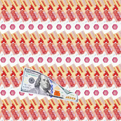 One hundred dollar bill on the background of russian five-thousand banknotes. Russian money devaluation concept