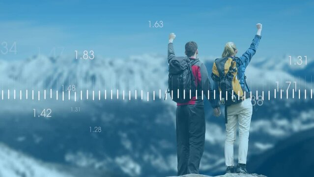Animation of data processing over caucasian couple raising hands in mountains