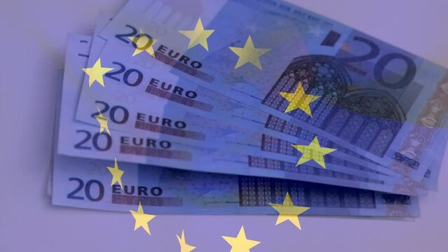 Animation of flag of european union over euro currency banknotes