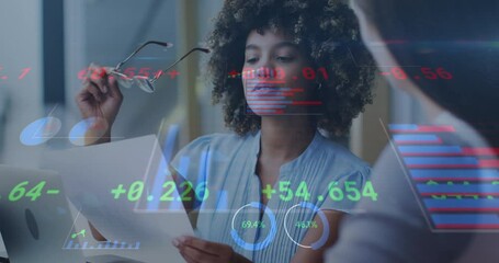 Animation of data processing over diverse businesswomen talking - Powered by Adobe