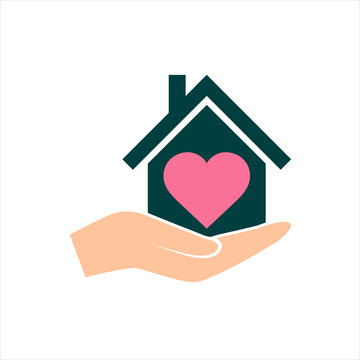 Hand holds house with heart icon, healthcare on white background, care and charity business concept