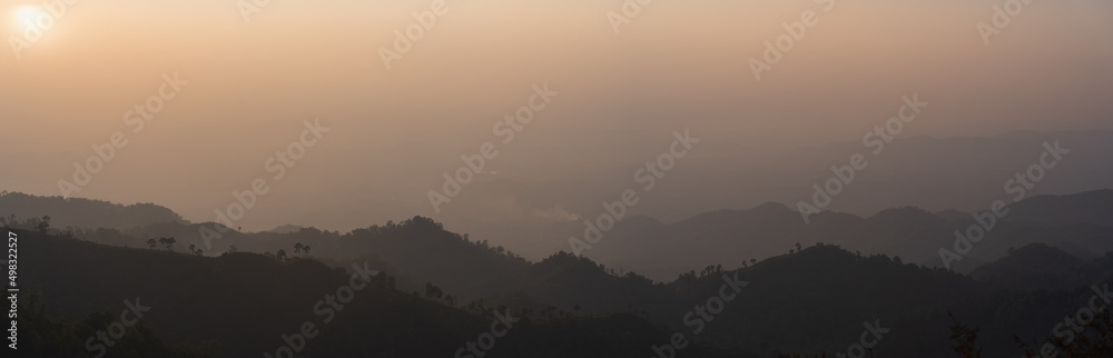 Canvas Prints silhouette and panorama layer of mountain with sunset background