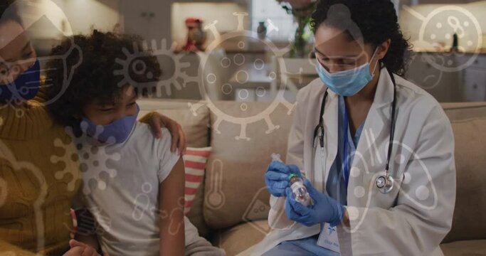 Animation Of Virus Icons Over Diverse Female Doctor And Child Being Vaccinated