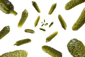 Collection of fresh Gherkin falling isolated on white background. Selective focus
