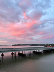 Obraz premium Sunset Over The Bridge And Sea