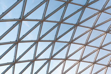 Low angle view of glass ceiling as background