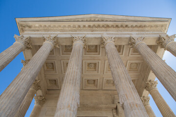 Maison Carrée, Nîmes, France:Details of the corinthian columns, capitals and decorated ceiling of...