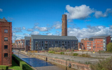 Chester, United Kingdom - 6th April 2022 : A view of the canal and Chester Leadworks and shot tower © Sean