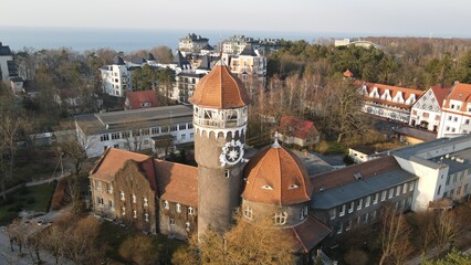 Svetlogorsk, Russia - May 28, 2021: The Water Tower is one of the most famous symbol of the city. Kaliningrad region.  Aerial view from drone 