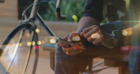 Animation of cityscape over caucasian man using smartphone