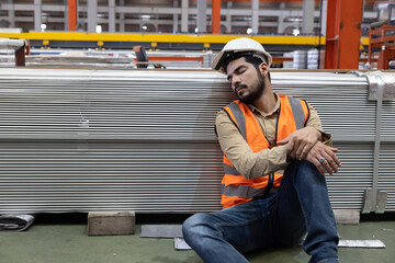 Industrial Worker Take a Nap in a Factory