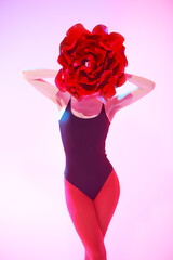 woman with red flower