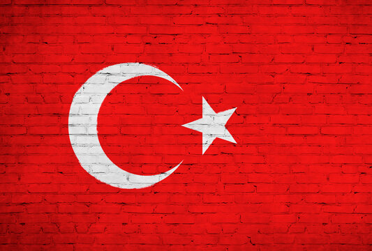 Turkey flag painted on brick wall. National country flag background photo