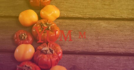 Animation of yummy text over vegetables