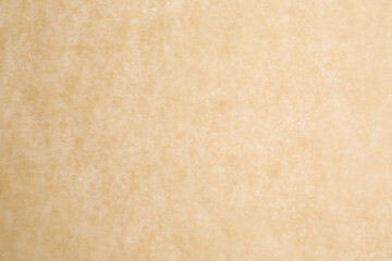 Texture of brown baking paper as background, closeup