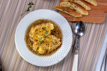 Classic French onion soup baked with cheese croutons