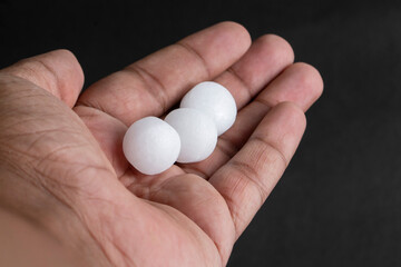 Naphthalene balls on the hand
