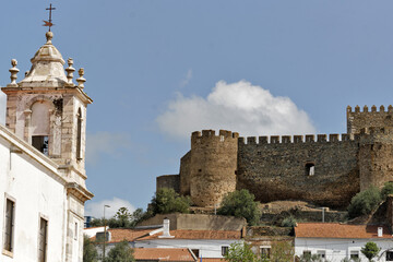 Fototapeta na wymiar church and Hilltop ruins of a castle dating to the 1200s offering vistas over the town of Portel, Portugal