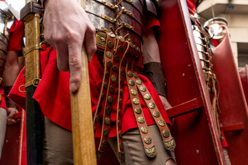 roman soldiers in a historical reenactment in easter. People performing a Roman legion - obrazy, fototapety, plakaty