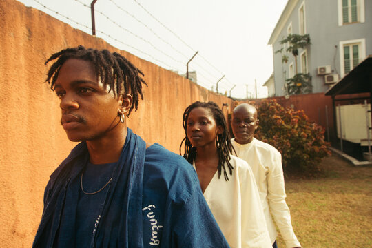 portrait short of a black eco textile team together 