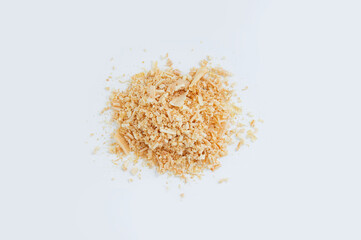 Sawdust wood shavings  heap. White background.