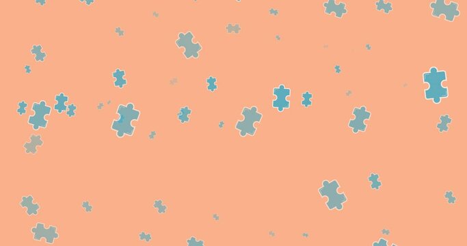 Animation of purple pieces of puzzle falling on orange background