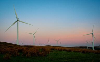 Fototapeta na wymiar Sunrise light, Wardlaw wind farm, Dalry, North Ayrshire, Scotland, UK