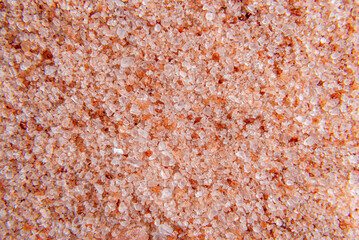 Pink Himalayan coarse grain salt texture. Top view. natural, diferent calibre