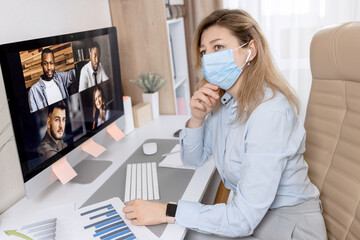 Close up of successful business woman holds a conference from home, speaks on the modern phone, discusses a successful project with colleagues online. Distant work concept.