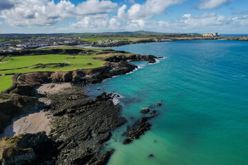 Aerial view of waves and some of rocks.
