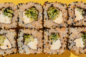 Suchi rolls with cucumber and cream cheese.
