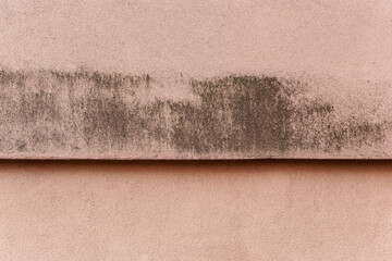 Black mould growing on wall of heat insulated flats building. It is common issue with polystyrene...