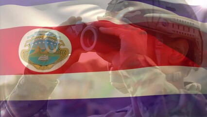 Animation of flag of costa rica over caucasian male soldier with binoculars - Powered by Adobe