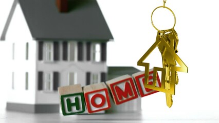 Animation of wooden blocks with text home and golden house shape with key over house - Powered by Adobe