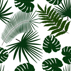 Tropical green seamless background palm leaves. Natural beauty.