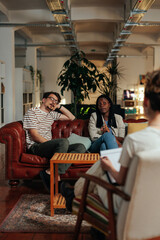 Obraz premium Biracial couple on the couch looking at consultant or therapist