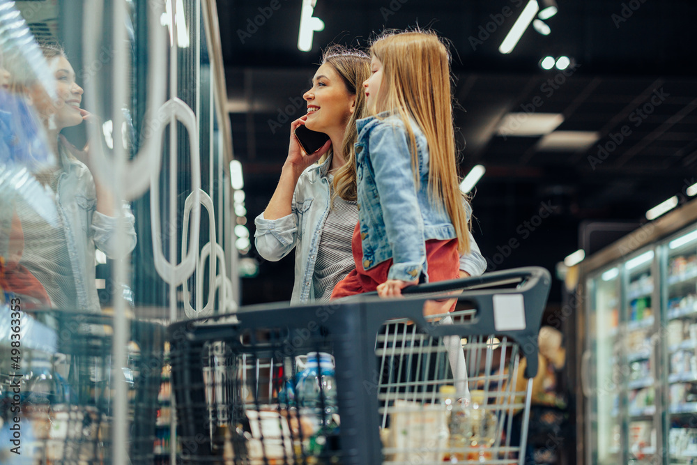 Wall mural mother and daughter grocery shop together