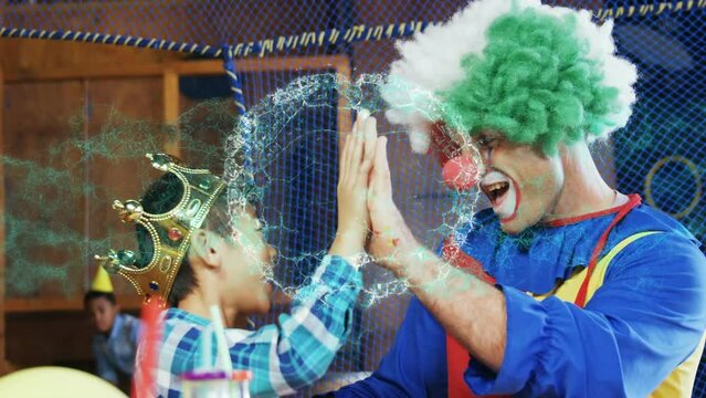 Animation of digital brain over diverse children and clown at birthday party