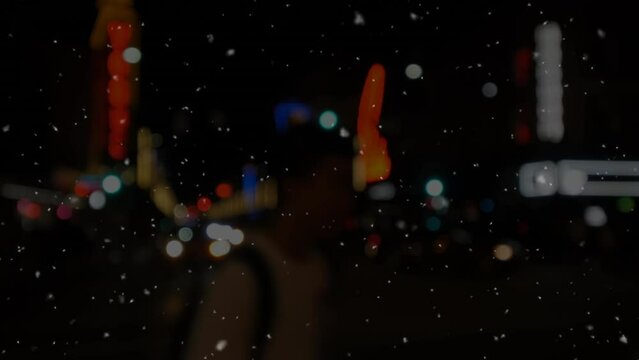 Animation of snow salling over blurred background