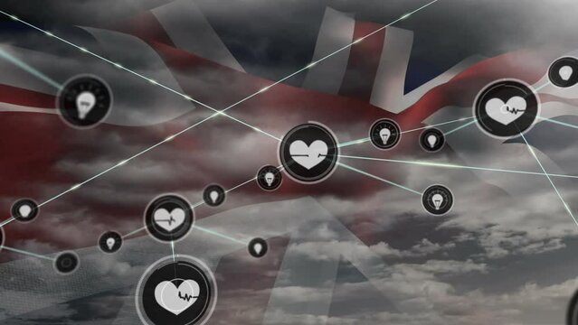 Animation of network of connection and icons over uk flag and cloudy sky